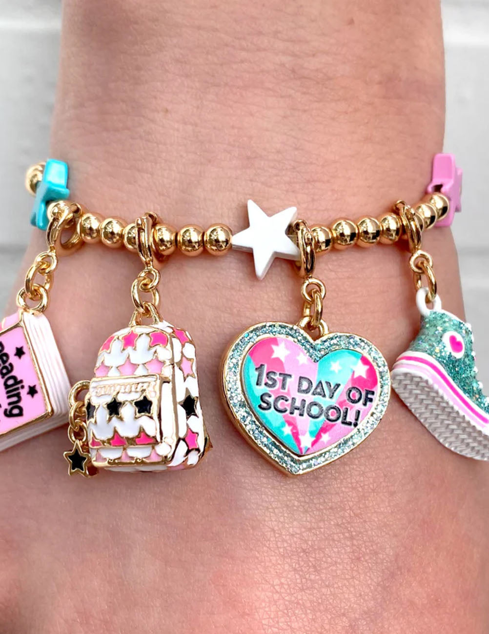 Bracciale elastico con perline multi-stella in oro